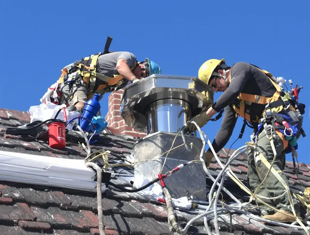 Protective chimney cap installed by Weston Chimney Sweep in Weston, FL