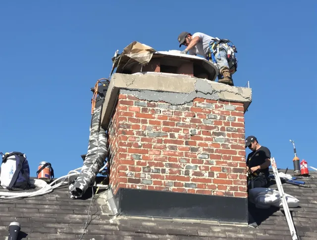 Weston Chimney Sweep installing a custom chimney crown in Weston, FL