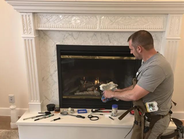 Weston Chimney Sweep performing fireplace maintenance in Weston, FL