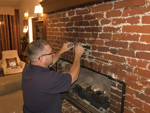 Weston Chimney Sweep expert fixing a fireplace in Weston, FL